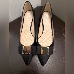 Cole Haan Black Pointed-Toe Heels with Gold Plaque Accent